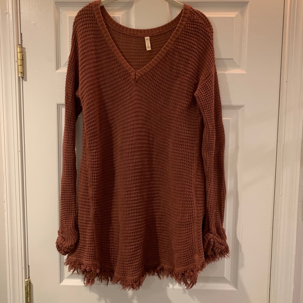 Hope’s burgundy flowy sweater